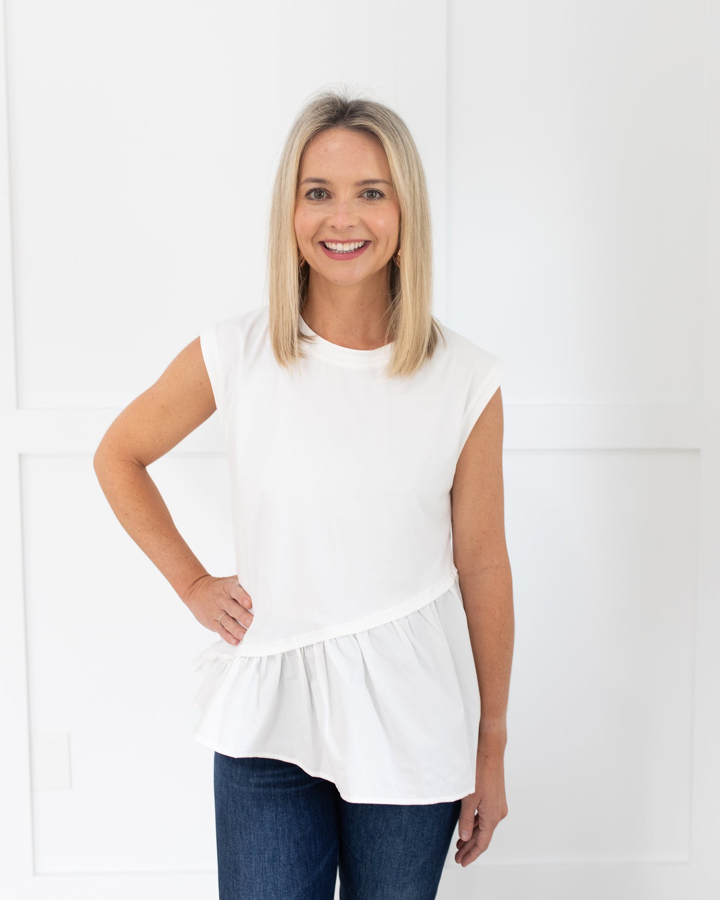 White Asymmetrical Peplum Hem Top