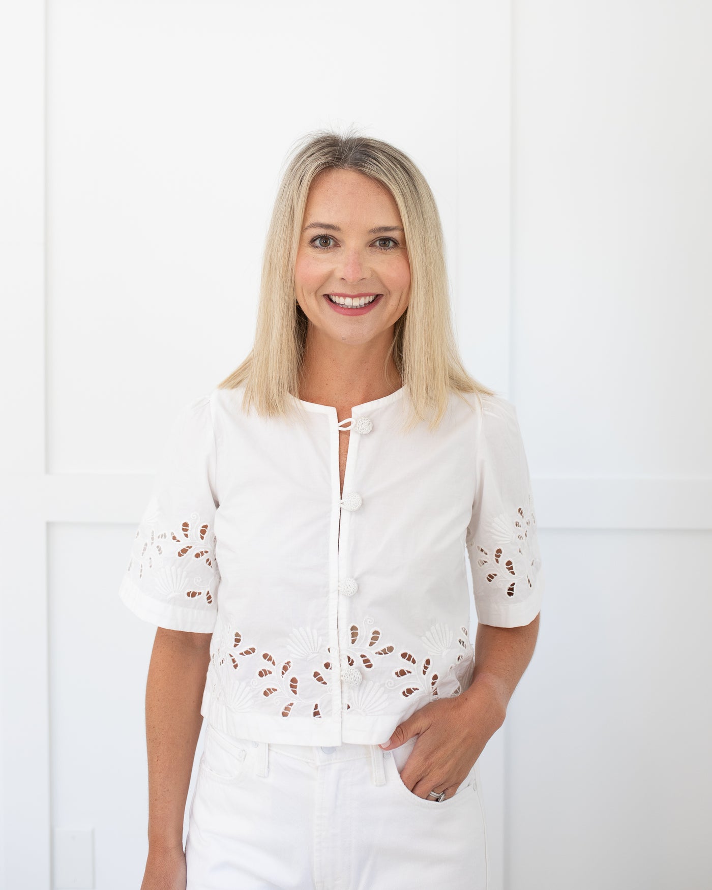 White eyelet embroidered shell top