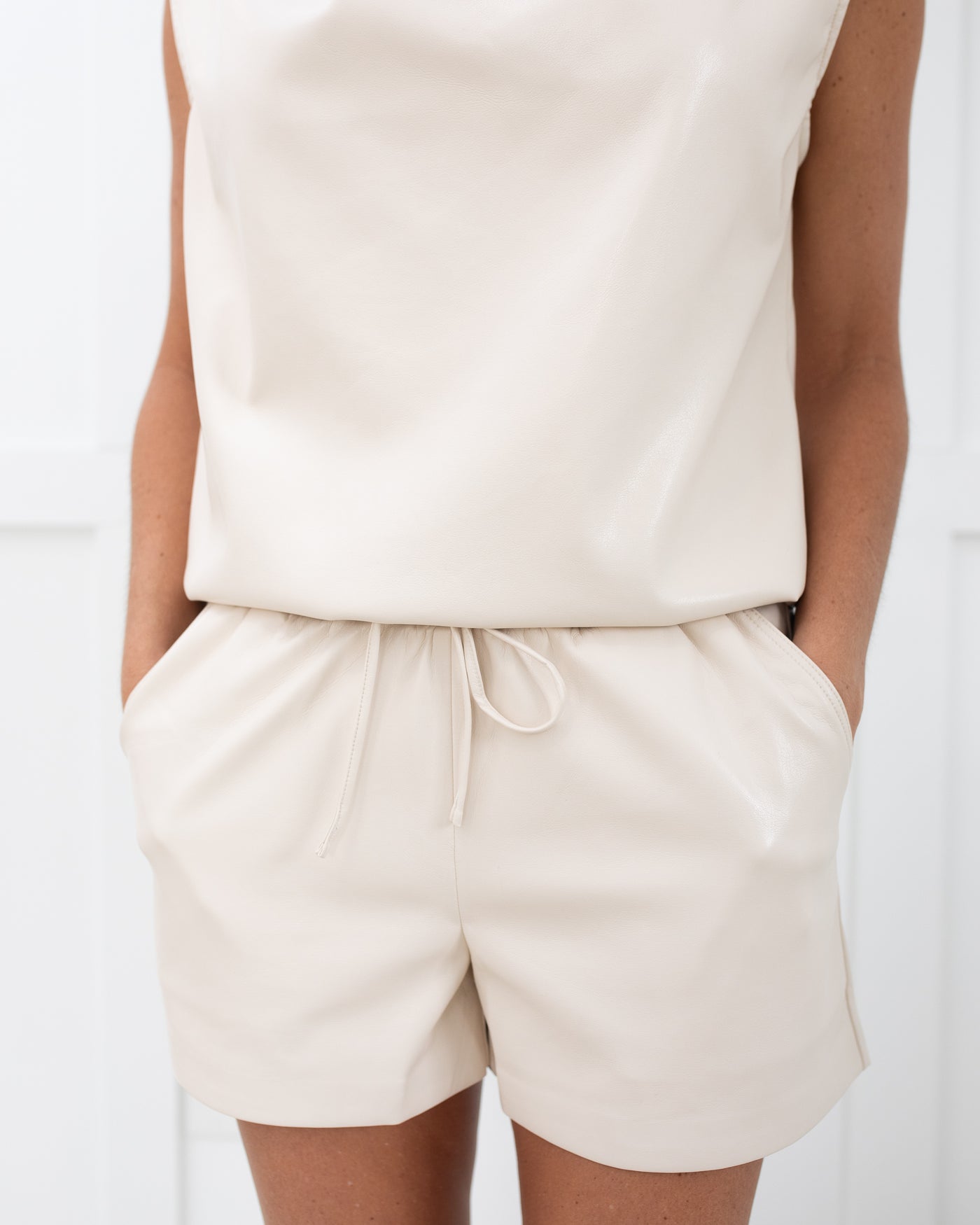 Vegan Leather Drape Neck Sleeveless Top in Cream