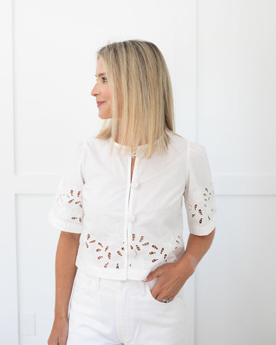 White eyelet embroidered shell top