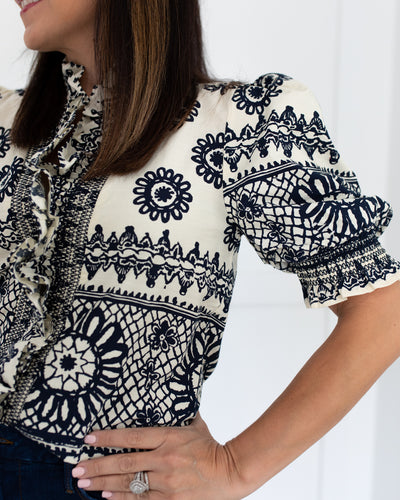 Ivory/Navy Print Embroidered Ruffle Neckline Top