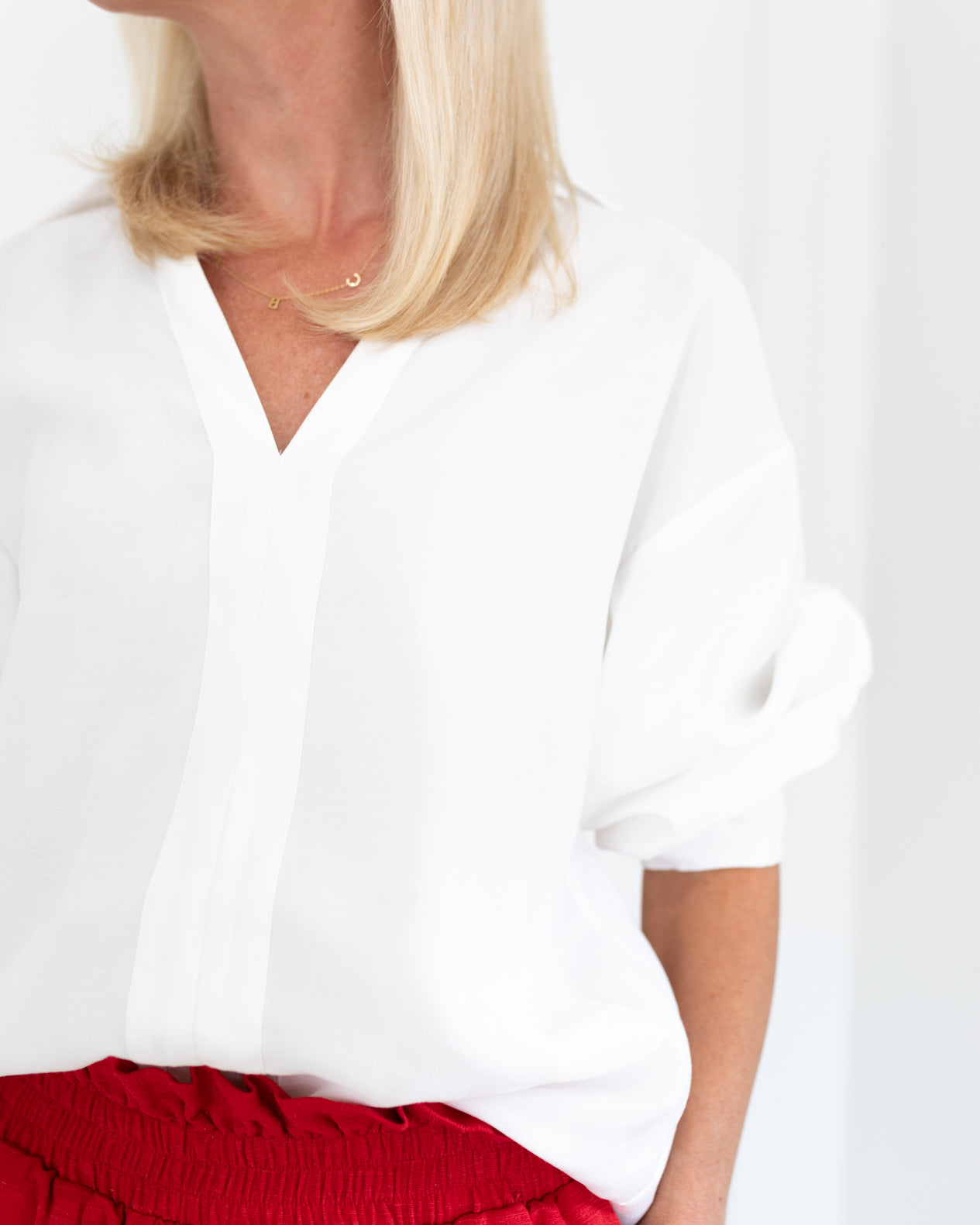 White V-neckline Drop Shoulder Blouse