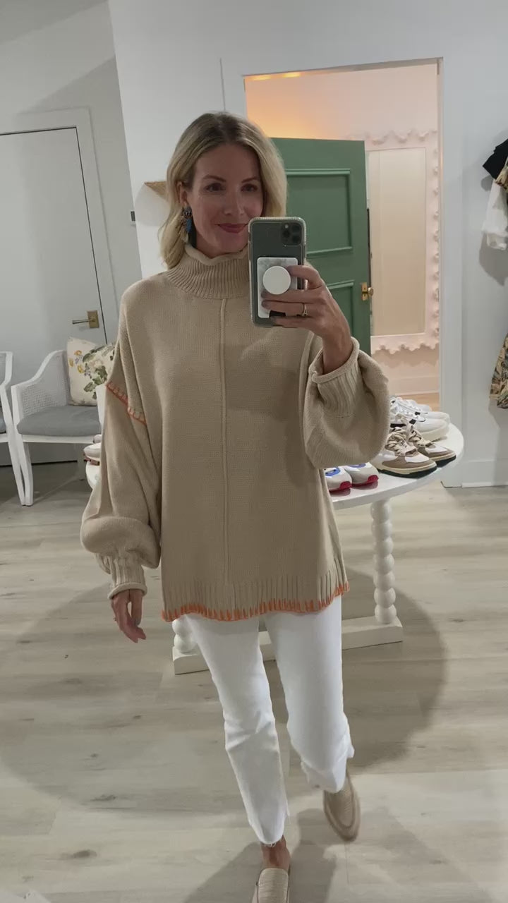 Tan Sweater with tangerine whip Stitch